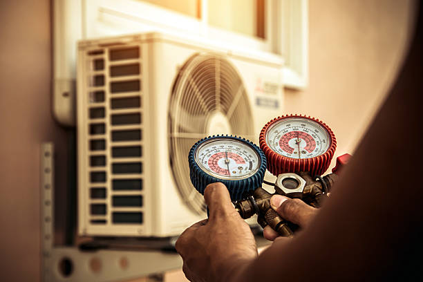 Professional Air Conditioning Service technician working in Forest City, FL